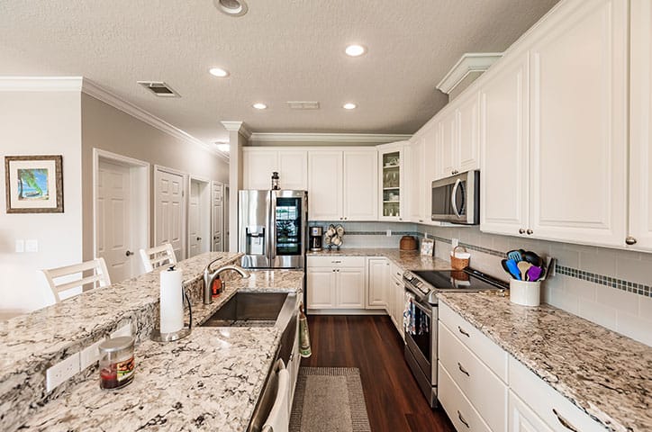 Interior of a manufactured home in Florida with bright open kitchen and living area